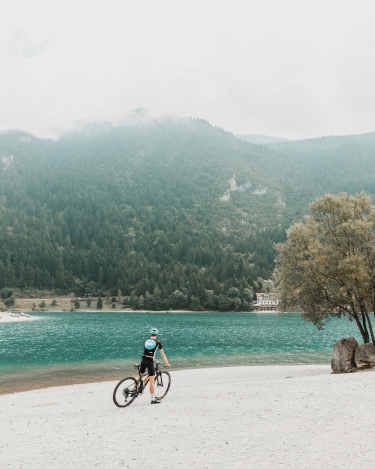 Cyclist On The Beach